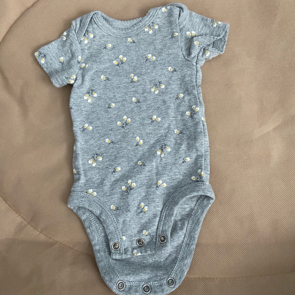 multiple different girl onesies